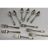 A set of six sterling silver cast dessert forks and a set of six sterling silver teaspoons,11.