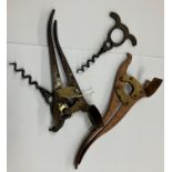 A Wolverson coppered and brass corkscrew with steel “The Lever Signet” screw,