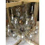 A vintage glass eighteen branch electrolier in the Venetian taste with glass drops,