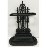 A Victorian black painted cast iron stick stand in the Aesthetic taste,