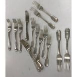 A set of eight George IV silver “Fiddle” pattern table forks initialled “F” (by Thomas Cox Savory,