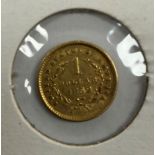 A United States gold $1 coin, 1852,