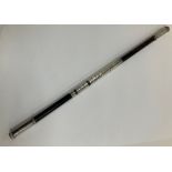 A Victorian silver mounted conductor's baton with inscribed plaque “Presented to Henry Nagel Esq by