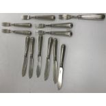 A set of six George V silver fish knives and forks (by Martin Hall & Co., Sheffield 1918), 24.