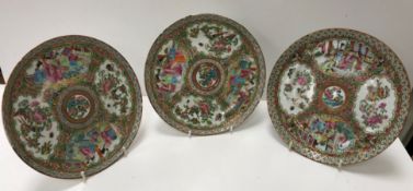 A set of three 19th Century Chinese famille rose plates,