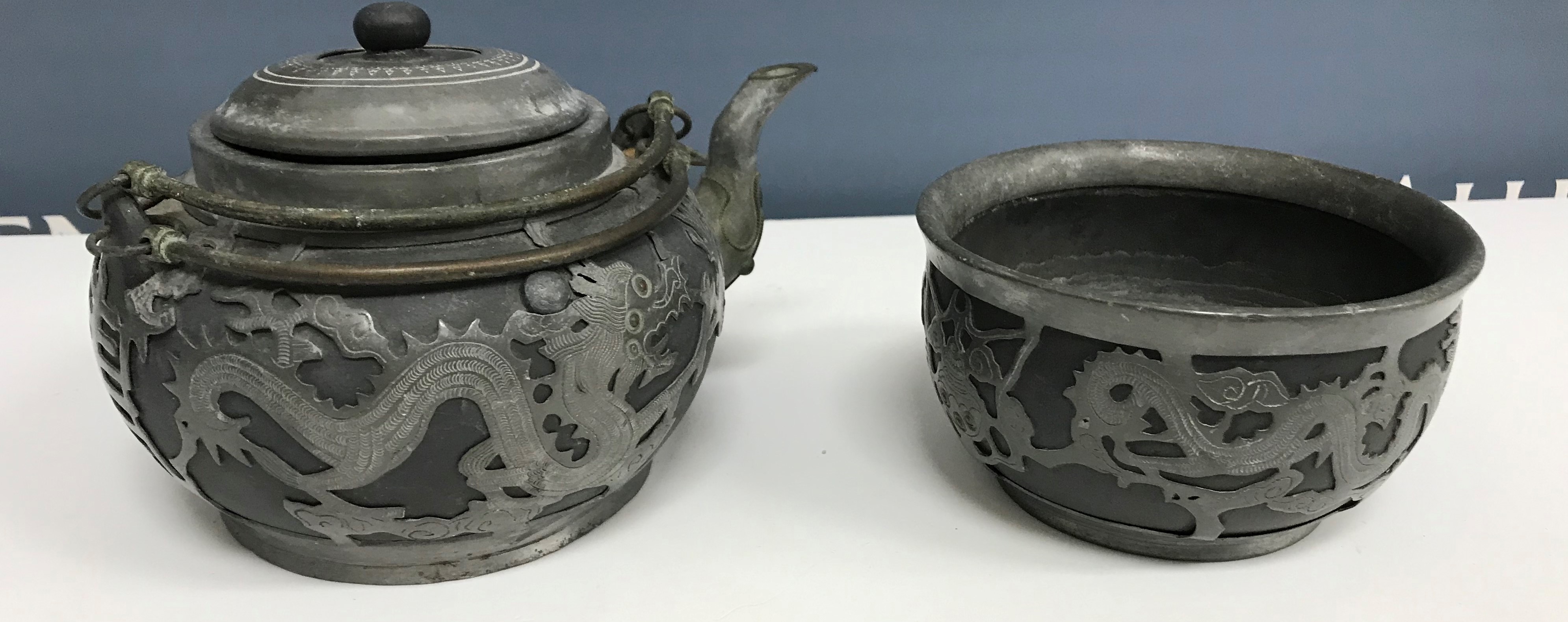 A 20th Century Chinese pewter mounted Yi Xing teapot and bowl,