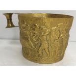 A Victorian silver gilt Arts & Crafts style mug with relief work decoration of cattle and figures