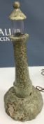 A vintage serpentine Lighthouse table lamp 41 cm high CONDITION REPORTS There are