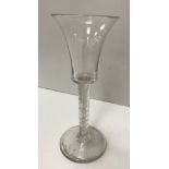 An 18th Century wine glass, the trumpet shaped bowl on a double air twist stem to circular foot 15.