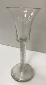 An 18th Century wine glass, the trumpet shaped bowl on a double air twist stem to circular foot 15.