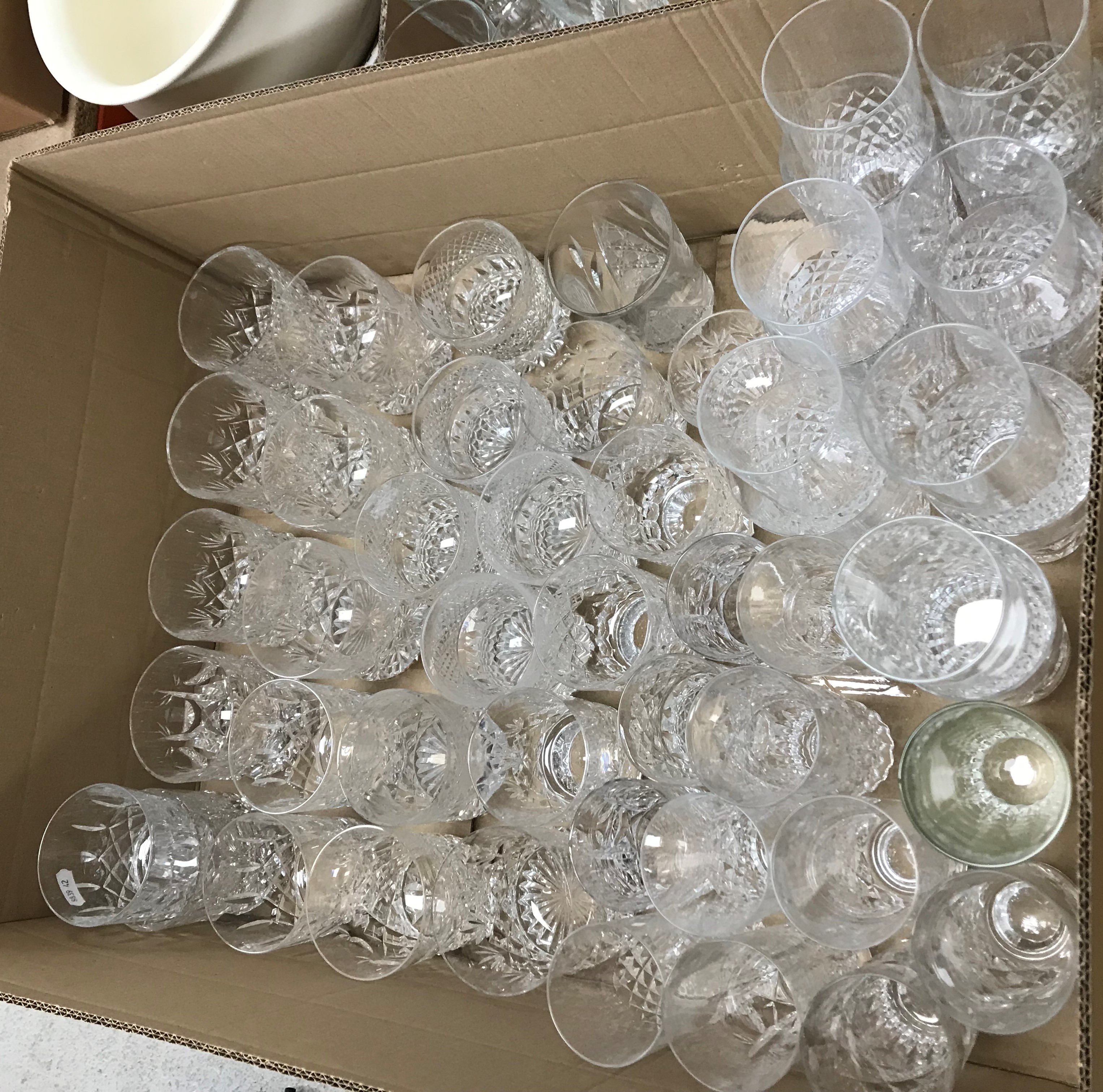 A large collection of various cut and moulded glassware including suite of French drinking glasses