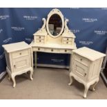 A cream painted dressing table in the Victorian style with mirrored and four drawer superstructure