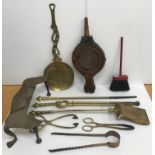 A box of assorted metal wares to include a brass companion set comprising shovel, tongs and poker,