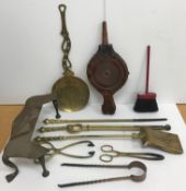 A box of assorted metal wares to include a brass companion set comprising shovel, tongs and poker,