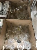 Six boxes of assorted china and glass to include decanters, drinking glasses,