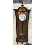 A Victorian walnut and ebonised cased Vienna regulator,