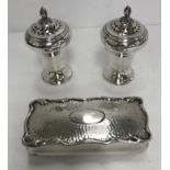 A pair of William IV silver pedestal peppers of inverted pear form,