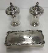 A pair of William IV silver pedestal peppers of inverted pear form,