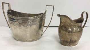 A George III silver oval sugar basin (by Peter, Ann and William Bateman, London 1800),