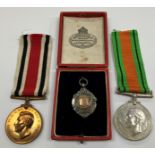 A collection of items to include a 1939-45 Defence medal with certificate,