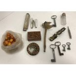 A small box of various objets de vertus including two small mother of pearl handled silver-bladed