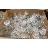 A large collection of various cut glass stemmed drinking glasses including wines, sherries, etc.