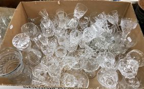 A large collection of various cut glass stemmed drinking glasses including wines, sherries, etc.