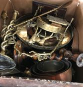 A box of various brass and copper ware including saucepans, gong, open barley twist candlesticks,