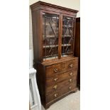 A late George III mahogany secretaire bookcase,