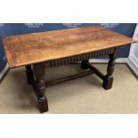 A 20th Century oak refectory style dining table in the 17th Century manner,