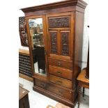 An Edwardian walnut wardrobe,