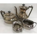 An Edwardian silver four-piece tea set of semi-reeded form, inscribed "Presented to LD ALSOP Esq.