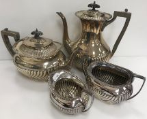 An Edwardian silver four-piece tea set of semi-reeded form, inscribed "Presented to LD ALSOP Esq.