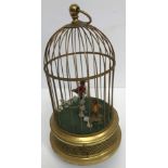 A 20th Century West German brass cased "singing bird" in bird cage automaton music box with pierced