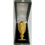 A Queen Elizabeth II 50 Year Jubilee 18 carat gold goblet decorated with dragon,