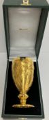 A Queen Elizabeth II 50 Year Jubilee 18 carat gold goblet decorated with dragon,