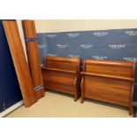 A pair of modern cherrywood single sleigh beds in the Louis-Philippe taste,