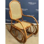 A modern Malaysian bentwood and caned rocking armchair in the manner of Michel Thonet 57 cm wide x