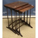 A nest of three Edwardian mahogany occasional tables on slender turned and ringed supports to