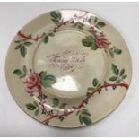 A 19th Century transfer and hand-decorated rose pattern "tongue" dish,