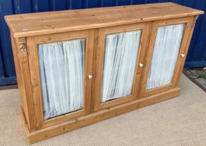 A modern pine side cabinet,