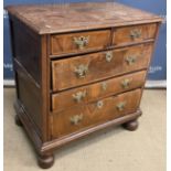 An 18th Century walnut and oak chest,