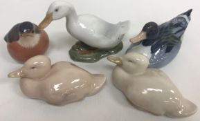 A collection of Royal Copenhagen bird figures including white duck (1192), mallard drake (119),