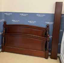 A modern mahogany double bedstead in the Victorian style,