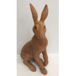 A Suzie Marsh coloured bisque pottery figure of a seated hare, limited edition No.