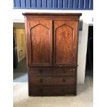 An early 19th Century mahogany linen press,