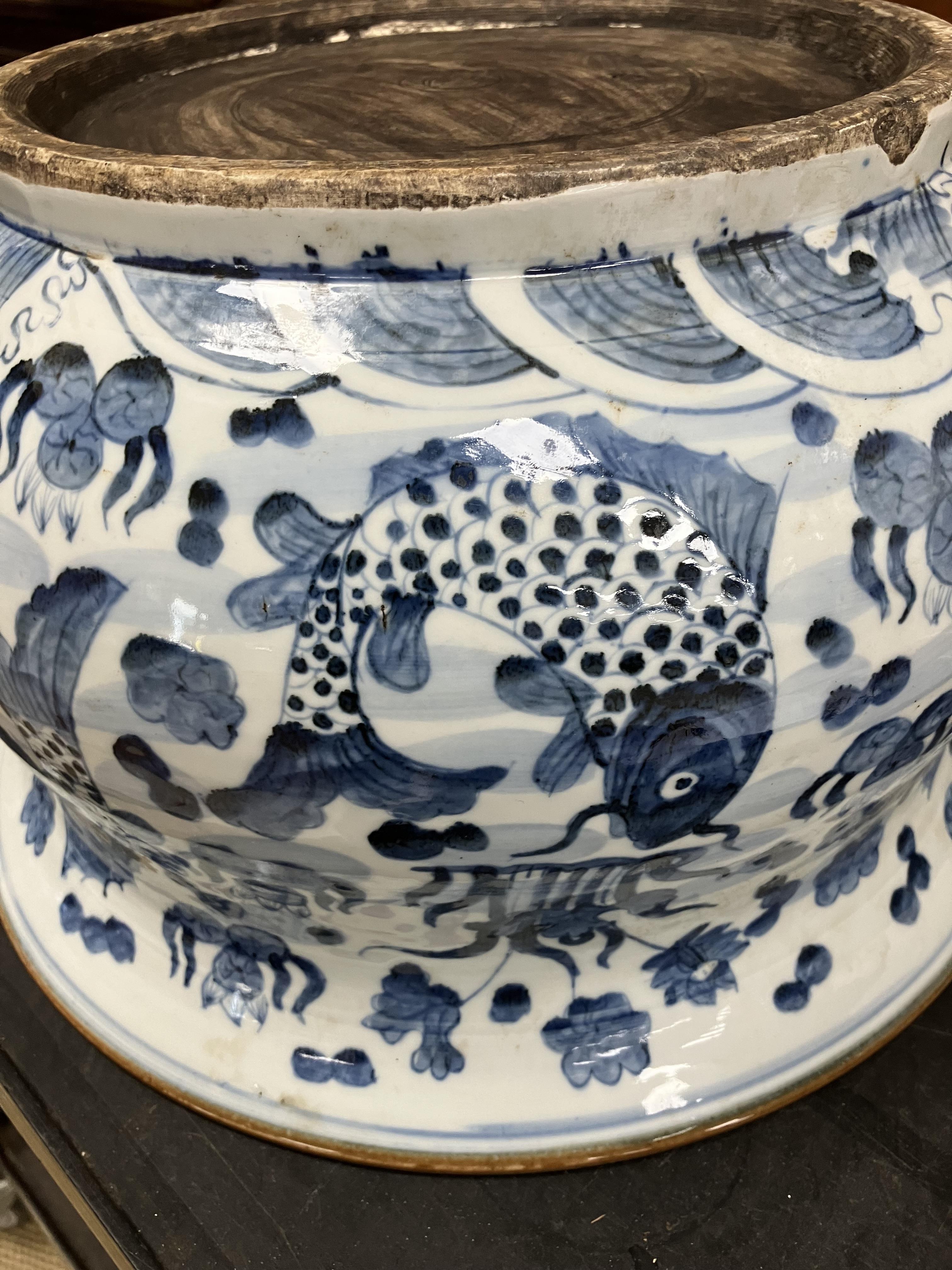 A large early 20th Century Japanese flared bowl with blue and white carp decoration, - Image 2 of 19