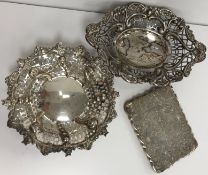 A silver bonbon dish with pierced decoration and scrolling foliate set edge (Chester 1896),