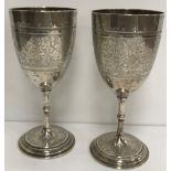 Two Victorian engraved silver trophy goblets,