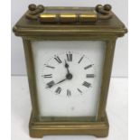 A circa 1900 brass cased carriage clock of typical form,
